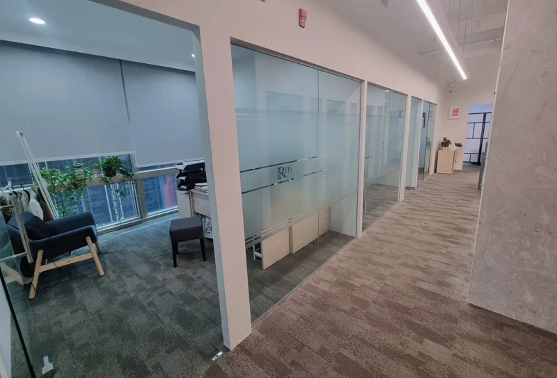 Office interior with glass partition meeting rooms